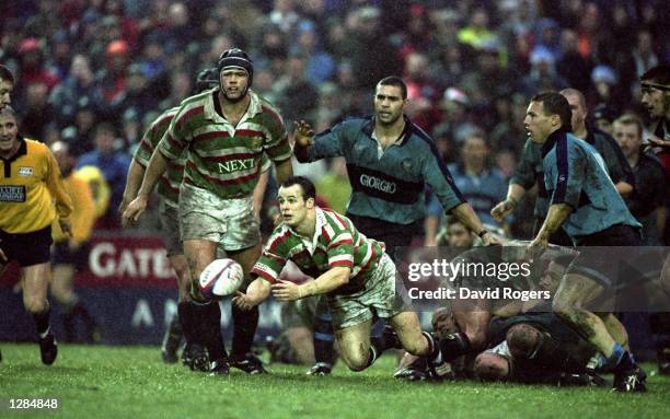 Austin Healey of the Leicester Tigers passes the ball from his pack during the Allied Dunbar Premiership 1 match against Bedford at Welford Road in...