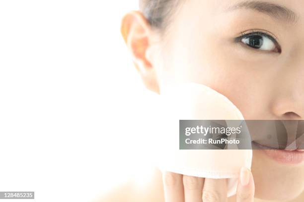 young woman beauty,woman with a puff - powder puff stock pictures, royalty-free photos & images