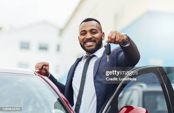 success will get you everything you want - african ethnicity car stock pictures, royalty-free photos & images