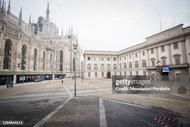 The square between the Duomo and the Palazzo Reale is half empty during the first day of the new Milanese lockdown due to the Coronavirus pandemic ....