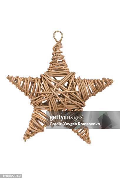 wooden wicker star, christmas tree toy isolated on white background - star decoration stock pictures, royalty-free photos & images