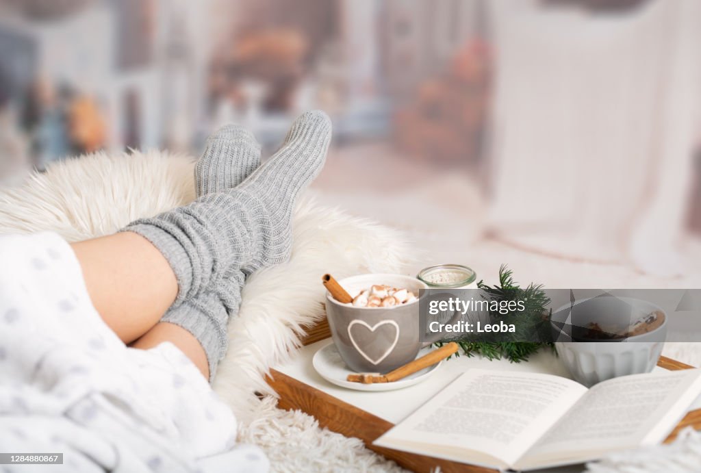 Cocoa, hot chocolate, book, cosy in the wintertime