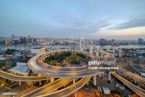 viaduct and highway in shanghai - bridge stock photos et images de collection