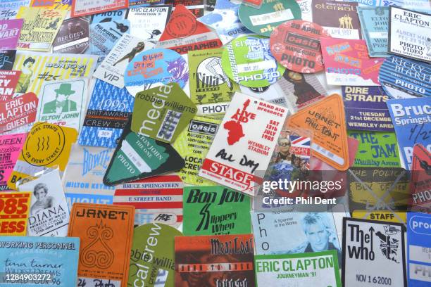 Music memorabilia - A large selection of photo, press and access passes for stadium and arena show artists from the 1980s and 1990s prominently...