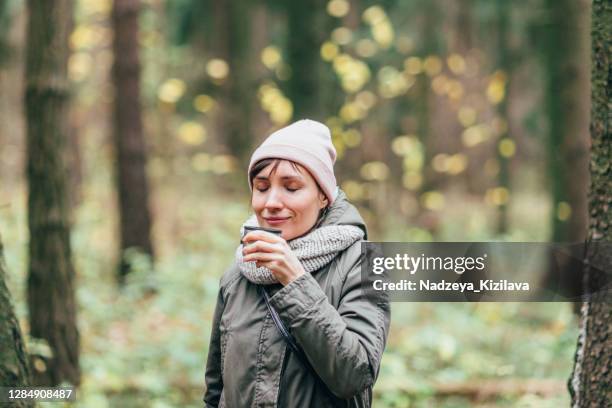 enjoying hot drink - women for wallpaper stock pictures, royalty-free photos & images