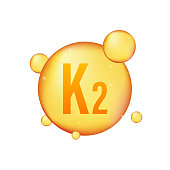 Vitamin K2 gold shining icon. Ascorbic acid. Vector illustration