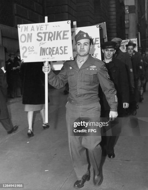 Striking workers holding placards on the picket at the offices of Anaconda Copper, an American mining company, on Broadway in New York City, New...