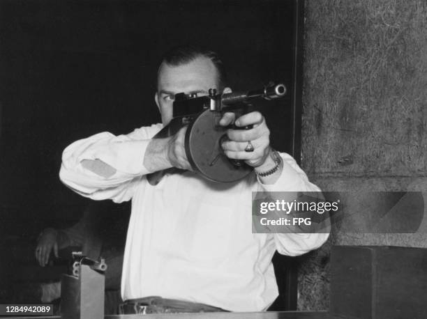 Tommy Gun Photos Photos and Premium High Res Pictures - Getty Images