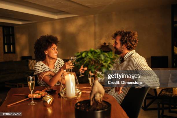 stories over a glass of wine - dinner date stock pictures, royalty-free photos & images