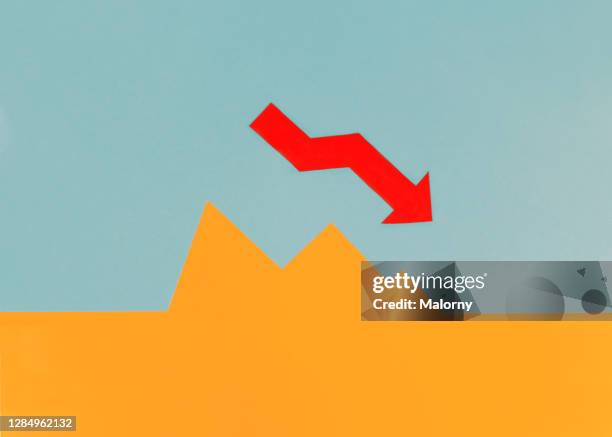 line chart with red arrow pointing down. interest rate, bear market, recession or stock market crash - dax stock market index stock pictures, royalty-free photos & images