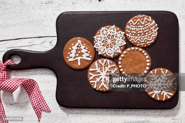 christmas gingerbread, christmas biscuits with icing - national day in sweden 2017 stock pictures, royalty-free photos & images