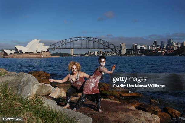 Koomurri Dance Group members Kerry Johnson and Rayma Johnson pose for photos during a NAIDOC Week event hosted by The Royal Botanic Garden Sydney on...