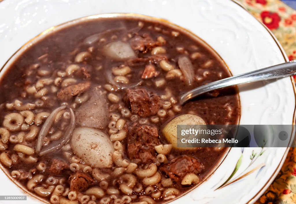 Seen from above, plate with black bean soup