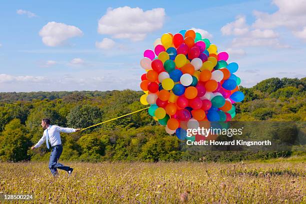 Balloon Running 418 Colorful Balloons Running Stock Photos, High-Res Pictures, and ...