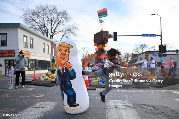 It felt good," said Landyn Simmons-Davis of south Minneapolis, after he kicked an inflatable punching bag of U.S. President Donald Trump Saturday...