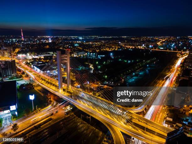 view of bucharest from above during the night, romania - bucarest photos et images de collection