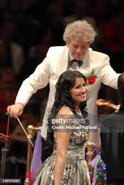 Russian soprano Anna Netrebko performs on stage with conductor Jiri Belohlavek at the Last Night Of The Proms, Royal Albert Hall, London, 8th...