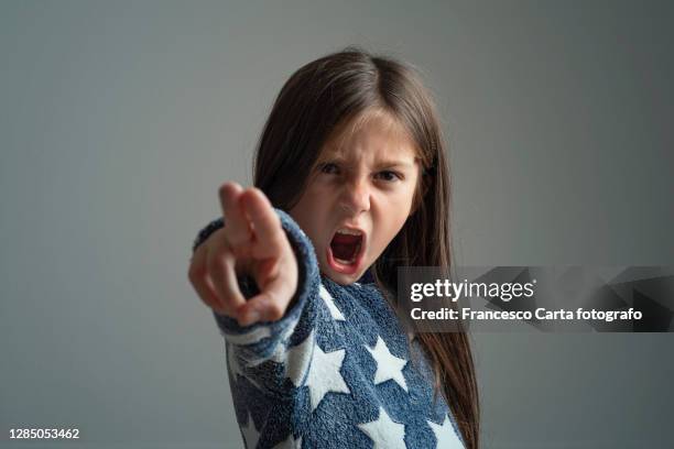 angry little girl - furious child stock pictures, royalty-free photos & images