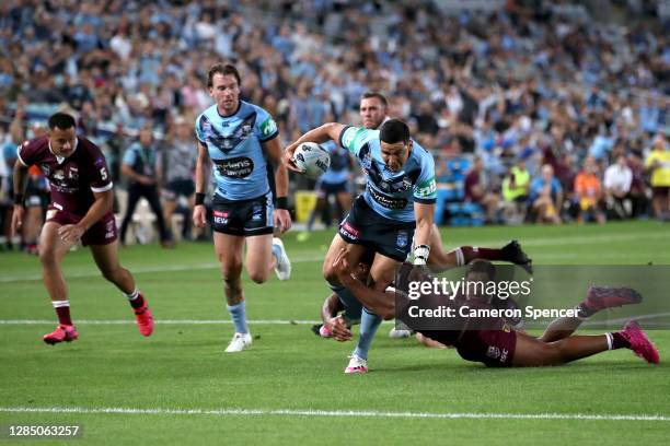 Cody Walker of the Blues dives over to score a try during game two of the 2020 State of Origin series between the New South Wales Blues and the...