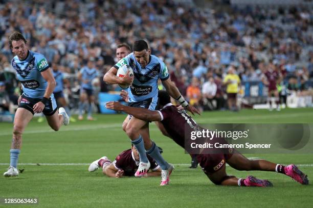 Cody Walker of the Blues on his way to score a try during game two of the 2020 State of Origin series between the New South Wales Blues and the...