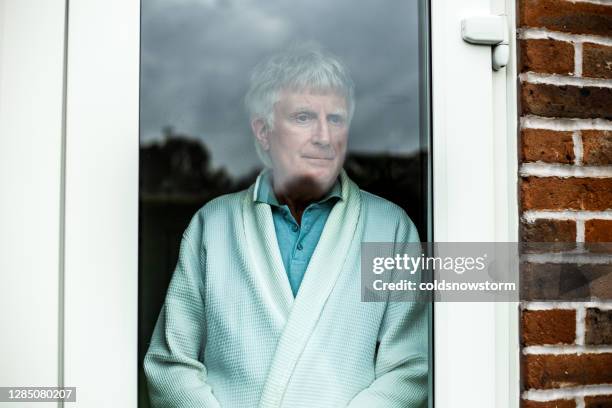 Man Stuck In Window 221 Man Trapped Behind Glass Stock Photos, High-Res Pictures, and ...