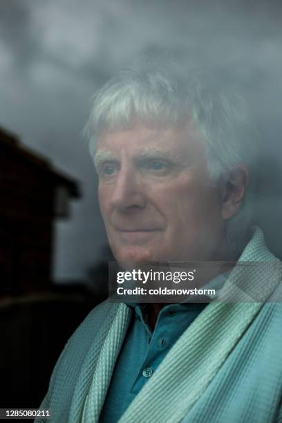 Man Stuck In Window 207 Man Trapped Behind Glass Stock Photos, High-Res Pictures, and ...