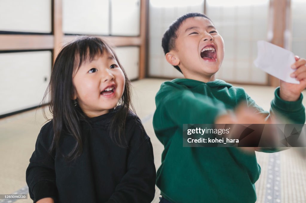 Japanese children getting Otoshidama, money given as a gift at the New Year