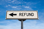Refund road sign, arrow on blue sky background. One way blank road sign with copy space. Arrow on a pole pointing in one direction.