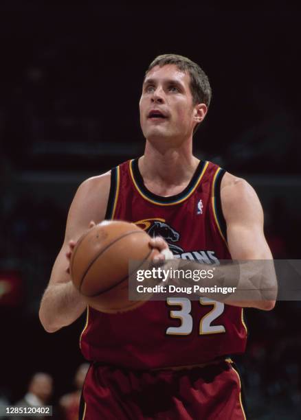 Christian Laettner, Power Forward for the Detroit Pistons prepares to make a free throw during the NBA Atlantic Division basketball game against the...