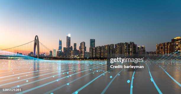 the blue grid line of the city skyline - industry sensor stock-fotos und bilder