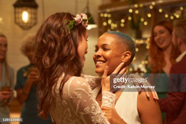 lesbian same sex wedding party. - recién casados fotografías e imágenes de stock