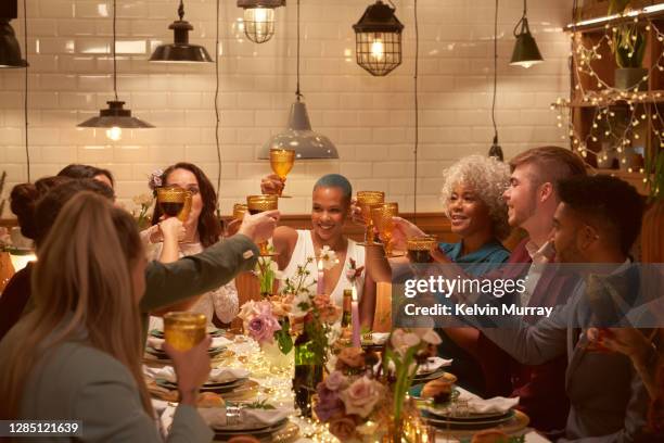 lesbian wedding with friends - celebratory toast stock pictures, royalty-free photos & images