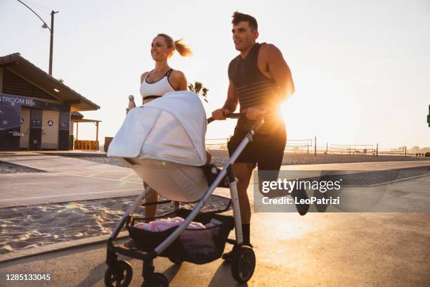 Running With Baby 2,058 Man Running Baby Stock Photos, High-Res Pictures, and Images ...