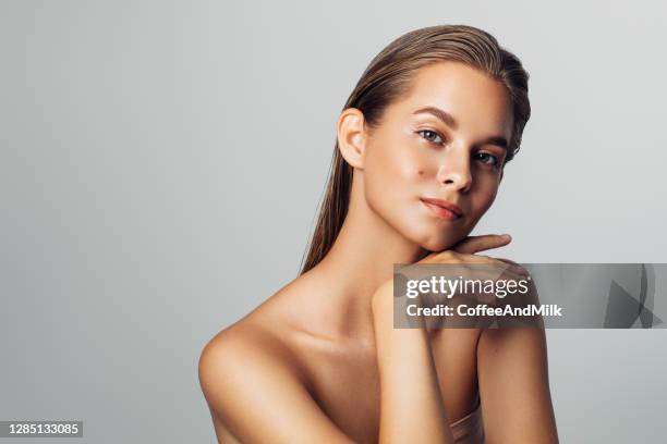 beautiful girl with wet hair - beautiful woman shoulder stock pictures, royalty-free photos & images