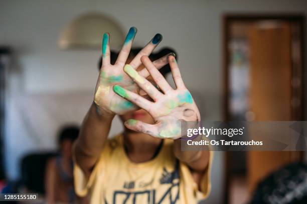 girl hands stained with pastel paint - pastel crayon stock pictures, royalty-free photos & images