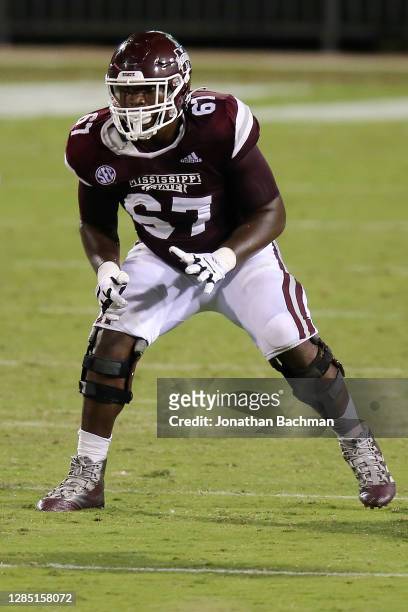 Charles Cross of the Mississippi State Bulldogs in action against the Arkansas Razorbacks during a game at Davis Wade Stadium on October 03, 2020 in...