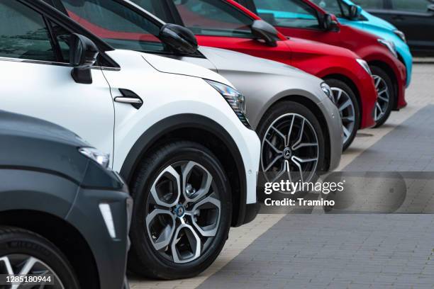 cars on a parking - veículo terrestre imagens e fotografias de stock