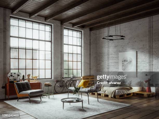 panoramisch uitzicht op een appartement loft in een new york industriële stijl - loft stockfoto's en -beelden