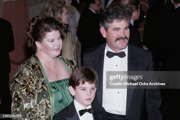 American actor Henry Thomas with his parents, Carolyn L Thomas and Henry Thomas Sr, attend the 40th Annual Golden Globe Awards, held at the Beverly...