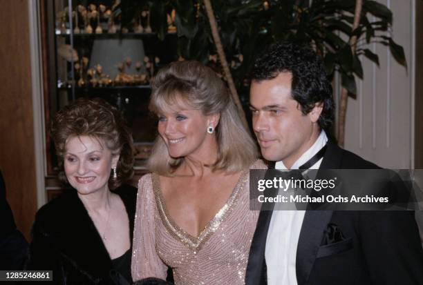 Julie Warren , American actress Linda Evans and American real estate developer and hotelier George Santo Pietro attend the 40th Annual Golden Globe...