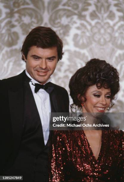 American actor Robert Urich and Puerto Rican actress Rita Moreno attend the 40th Annual Golden Globe Awards, held at the Beverly Hilton Hotel in...