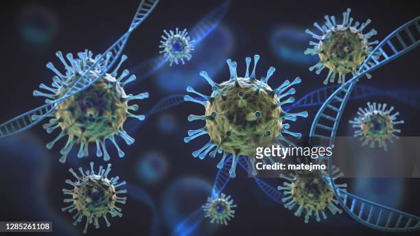 grüne und blaue coronaviruszellen unter vergrößerung, die mit der dna-zellstruktur verflochten sind - coronavirus stock-fotos und bilder