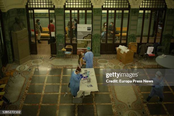 Health personnel perform rapid antigen tests on singing and music professionals at the Municipal Music Conservatory, on November 11, 2020 in...