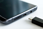 close-up macro photography USB Type-C. usb-c cable and smartphone