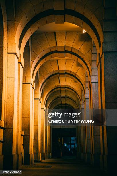 court of final appeal building (or legislative council or supreme court) in central hong kong at night - hong kong legislative council stock pictures, royalty-free photos & images