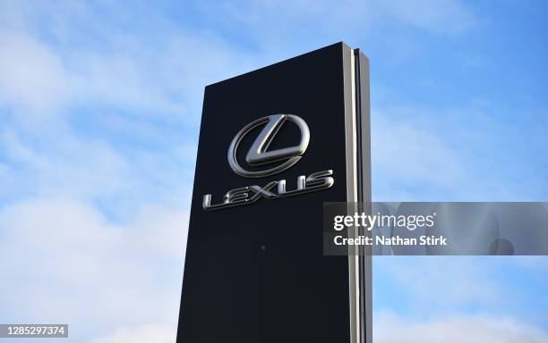The logo of car dealership and manufacture Lexus is seen outside its stores on November 12, 2020 in Stoke-on-Trent, Staffordshire, England.