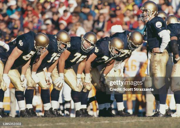 Rick Mirer, Quarterback for the University of Notre Dame Fighting Irish stands with his offensive line during the NCAA Southeastern Conference...