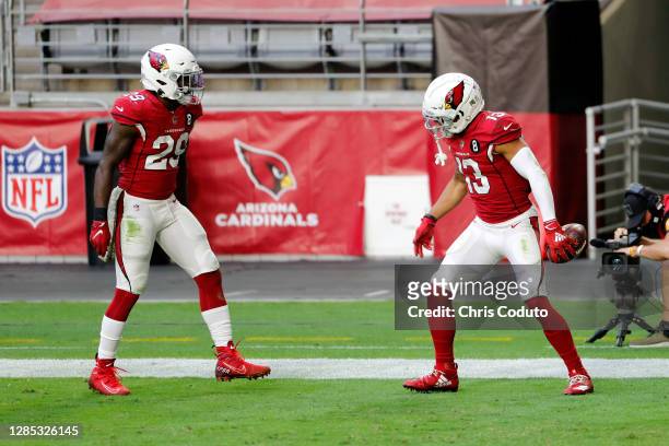 Wide receiver Christian Kirk celebrates a first half touchdown with running back Chase Edmonds of the Arizona Cardinals during the NFL game against...