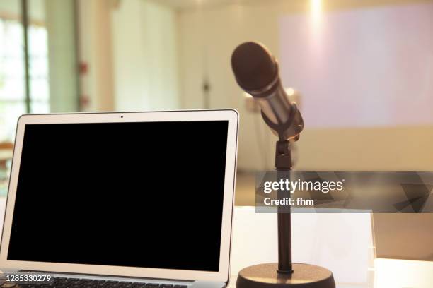 microphone and notebook computer - open mic stock pictures, royalty-free photos & images