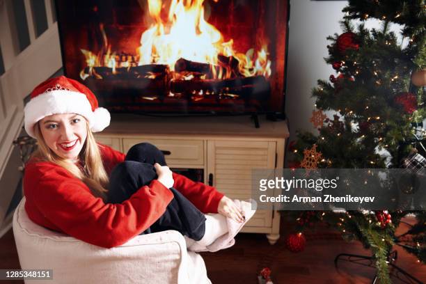 smiling female santa dressed for christmas - 18 23 months stock pictures, royalty-free photos & images